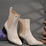 Women's black block heel ankle boots with smooth leather finish, elastic side panels, pull-tab, and pointed toe.