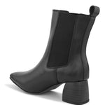 Black ankle boot with a smooth leather finish, elastic side panels, pull-tab, block heel, and pointed toe.