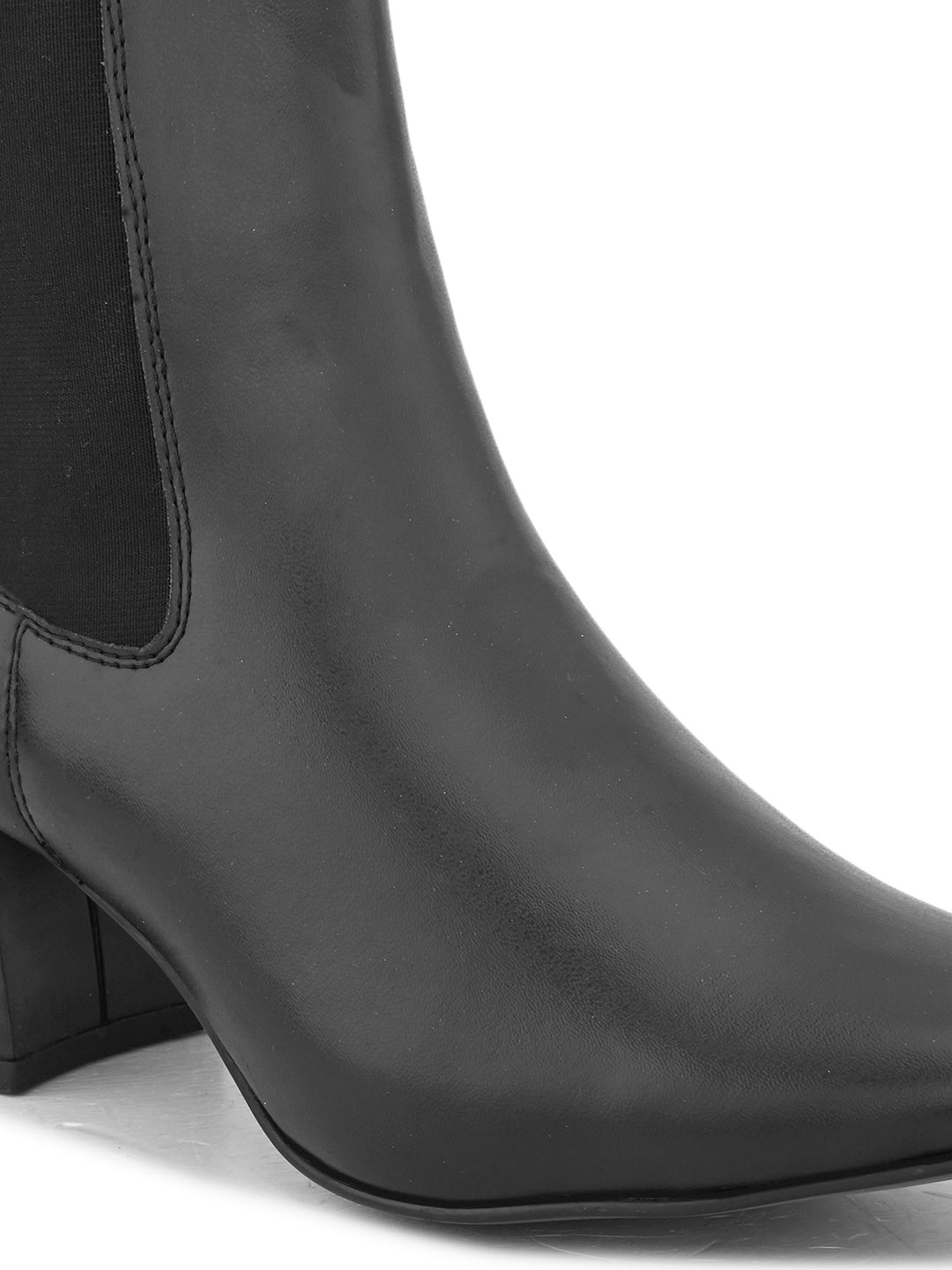 Black ankle boot with a smooth leather finish, elastic side panels, pull-tab, block heel, and pointed toe.