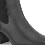 Black ankle boot with a smooth leather finish, elastic side panels, pull-tab, block heel, and pointed toe.