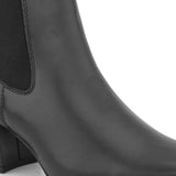 Black ankle boot with a smooth leather finish, elastic side panels, pull-tab, block heel, and pointed toe.