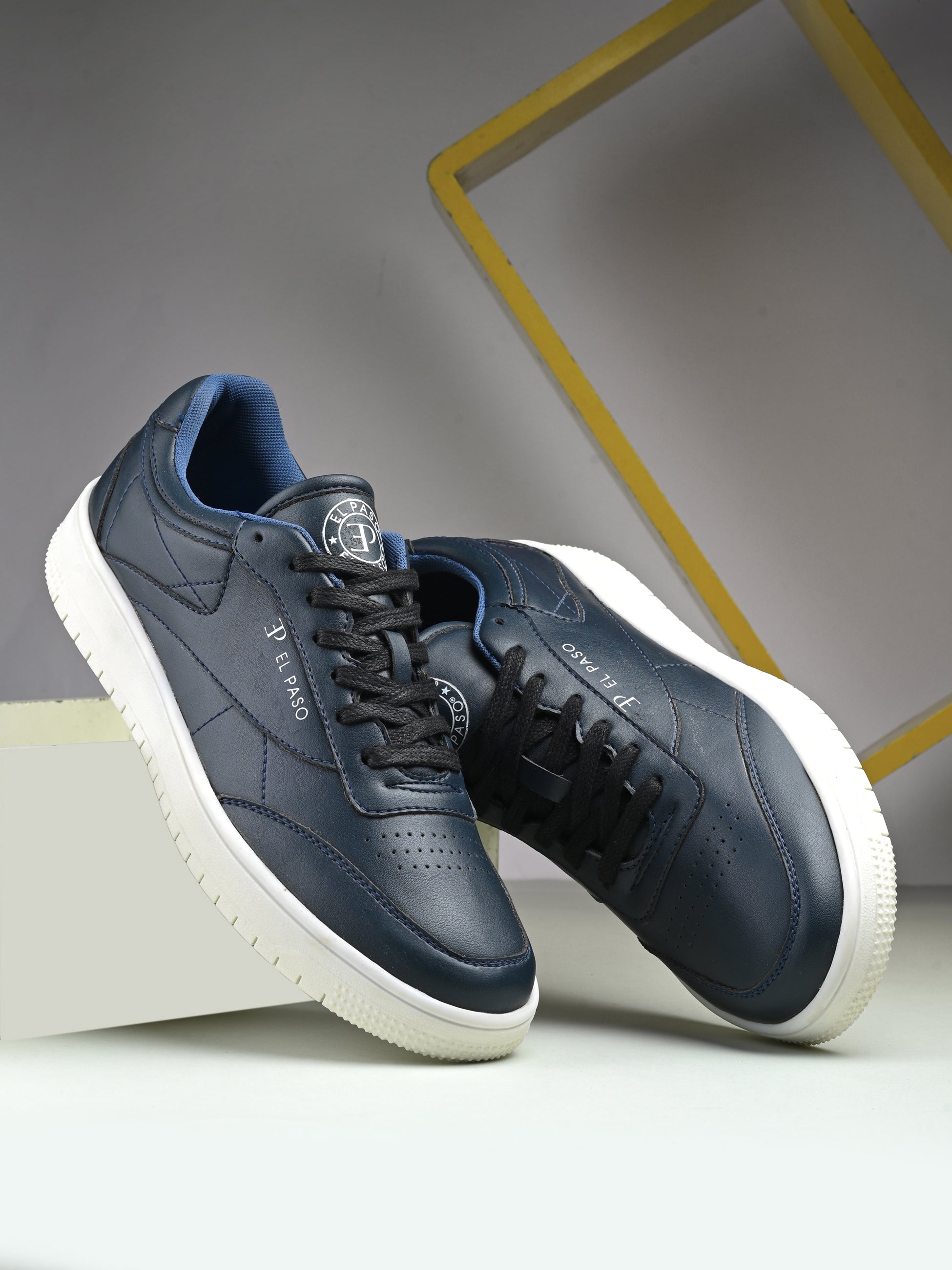 Navy Blue colour Men's casual lace-up sneakers with navy blue laces.