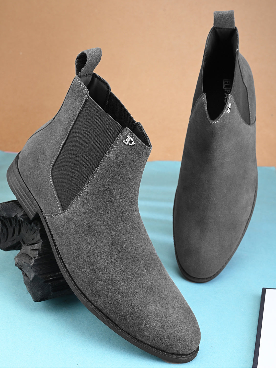 A image of elpaso grey Boots with white background