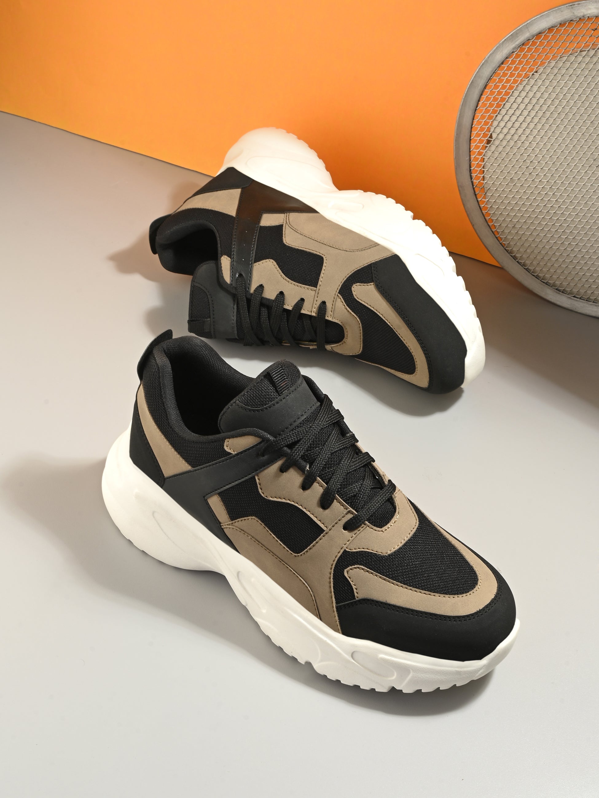 Stylish black and beige men mid-top chunky shoes with a modern chunky white sole, combining a sleek, contemporary design with a bold, fashionable look