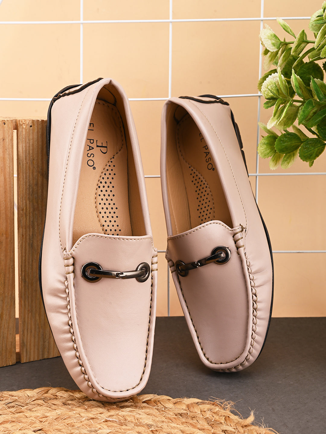 Women's Casual Slip-On Loafers in beige leather with a black sole and silver buckle detail for a stylish and comfortable look.