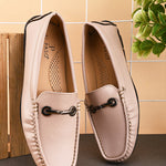 Women's Casual Slip-On Loafers in beige leather with a black sole and silver buckle detail for a stylish and comfortable look.