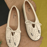 A beige Women Bows Ballerina Flats with a perforated and woven upper, round toe, metallic-tipped bow detail, and a flexible black rubber outsole for comfort and casual wear.