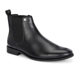 A sleek black leather Chelsea boot for women with elastic side panels, pull tab, low stacked heel, and a polished finish, offering a versatile style like the Men Faux Leather Casual Chelsea Boots.