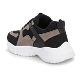 Stylish black and beige sneakers with a modern chunky white sole.