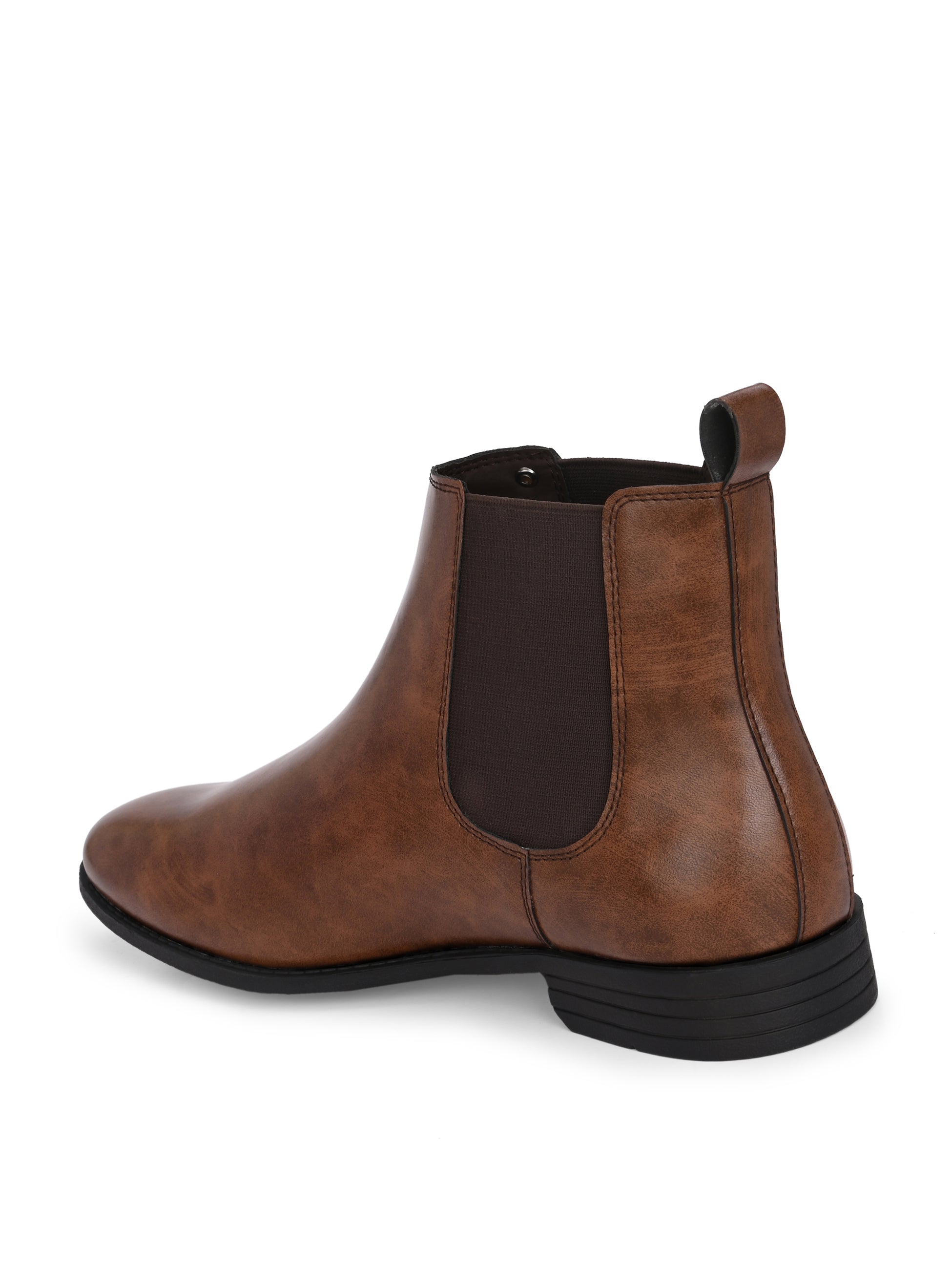 A sleek brown leather boot with elastic side panels, pull tab, low stacked heel, and a polished finish for a versatile look.