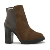 Brown suede ankle boots with a block heel, plus mid-top leather slip-on boots for versatile style and comfort.