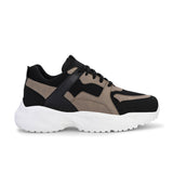 Stylish black and beige sneakers with a modern chunky white sole.