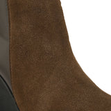 Brown suede ankle boots featuring a stylish block heel, perfect for both casual and formal occasions.