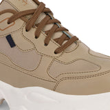 Beige sneaker with a textured white sole, brown laces, and modern detailing, designed for casual and stylish wear.