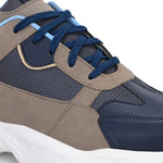 Navy blue and beige sneakers with a sporty chunky white sole