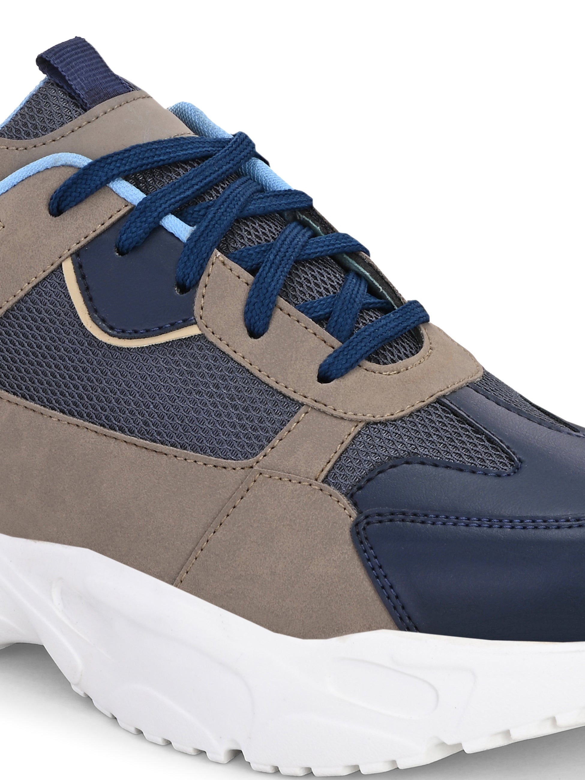 Navy blue and beige sneakers with a sporty chunky white sole