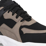 Stylish black and beige sneakers with a modern chunky white sole.