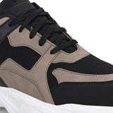 Stylish black and beige sneakers with a modern chunky white sole.