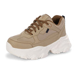 Beige sneaker with a textured white sole, brown laces, and modern detailing, designed for casual and stylish wear.