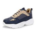 Navy blue and beige sneakers with a sleek design and durable chunky sole, perfect for a modern and stylish look. These are sleek design sneakers for men, combining comfort and fashion.