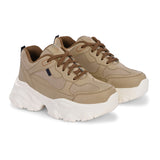 Beige chunky sneaker with a textured white sole, brown laces, and modern detailing, designed for casual and stylish wear.