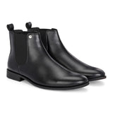 A sleek black leather Chelsea boot for women with elastic side panels, pull tab, low stacked heel, and a polished finish, offering a versatile style like the Men Faux Leather Casual Chelsea Boots.