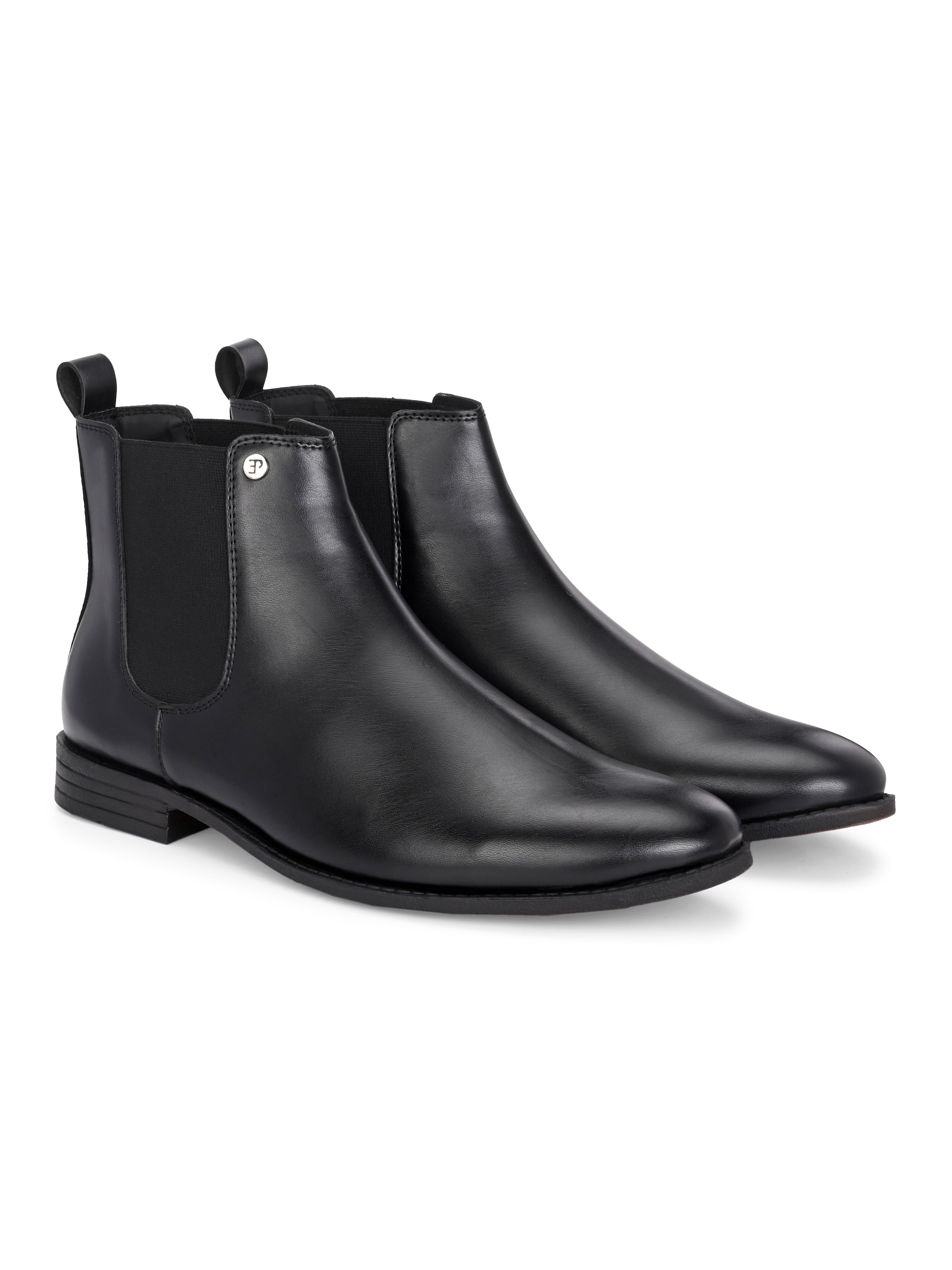 A sleek black leather Chelsea boot for women with elastic side panels, pull tab, low stacked heel, and a polished finish, offering a versatile style like the Men Faux Leather Casual Chelsea Boots.