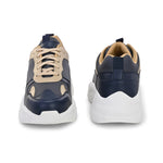 Navy blue and beige sneakers with a sleek design and durable chunky sole.