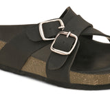 Black slip-on flats, showcasing its design and material details.