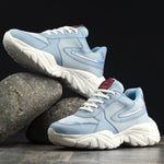 Women Sneakers in blue with a sleek design and lightweight construction, perfect for athletic activities and all-day comfort.