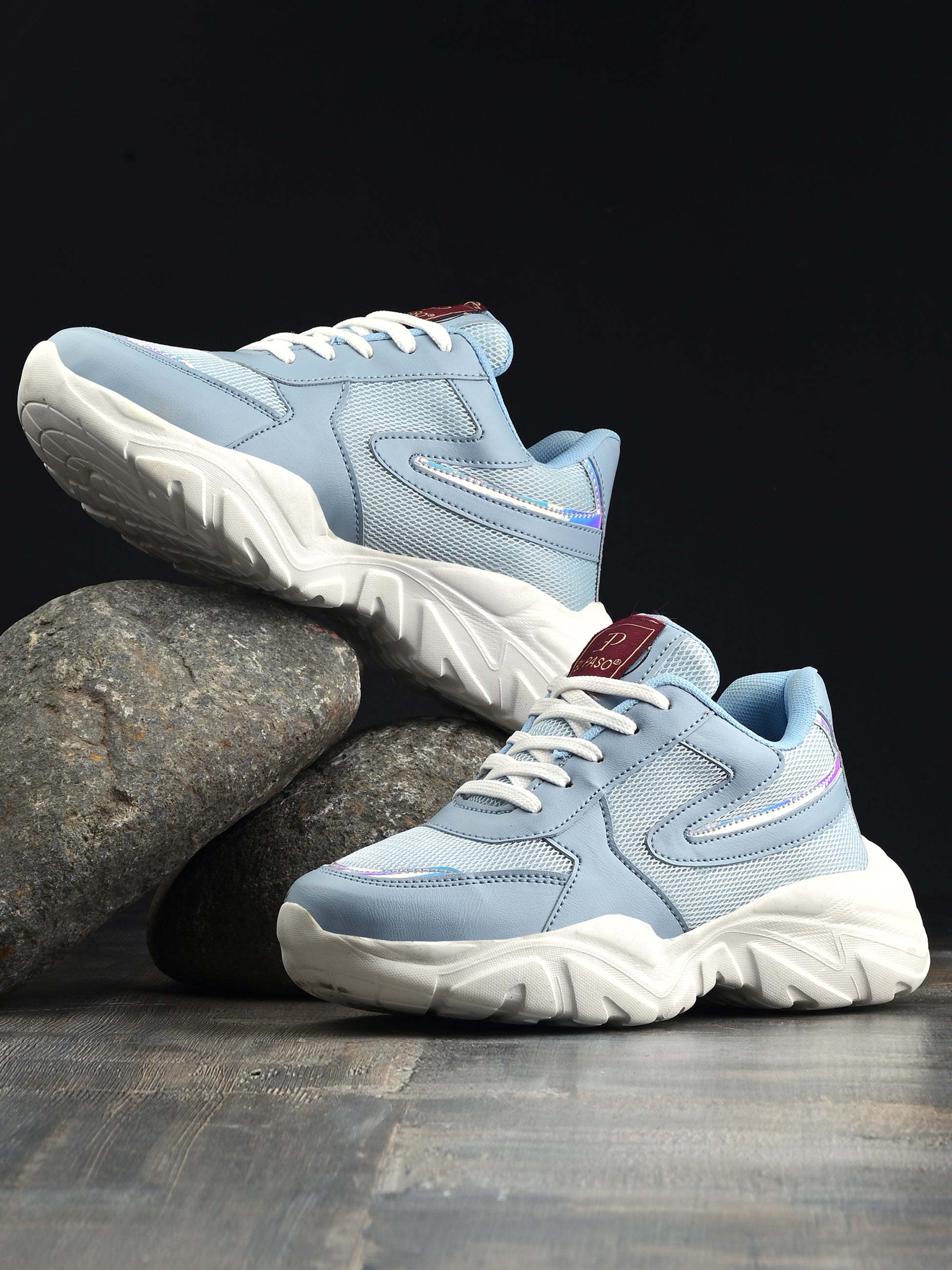 Women Sneakers in blue with a sleek design and lightweight construction, perfect for athletic activities and all-day comfort.