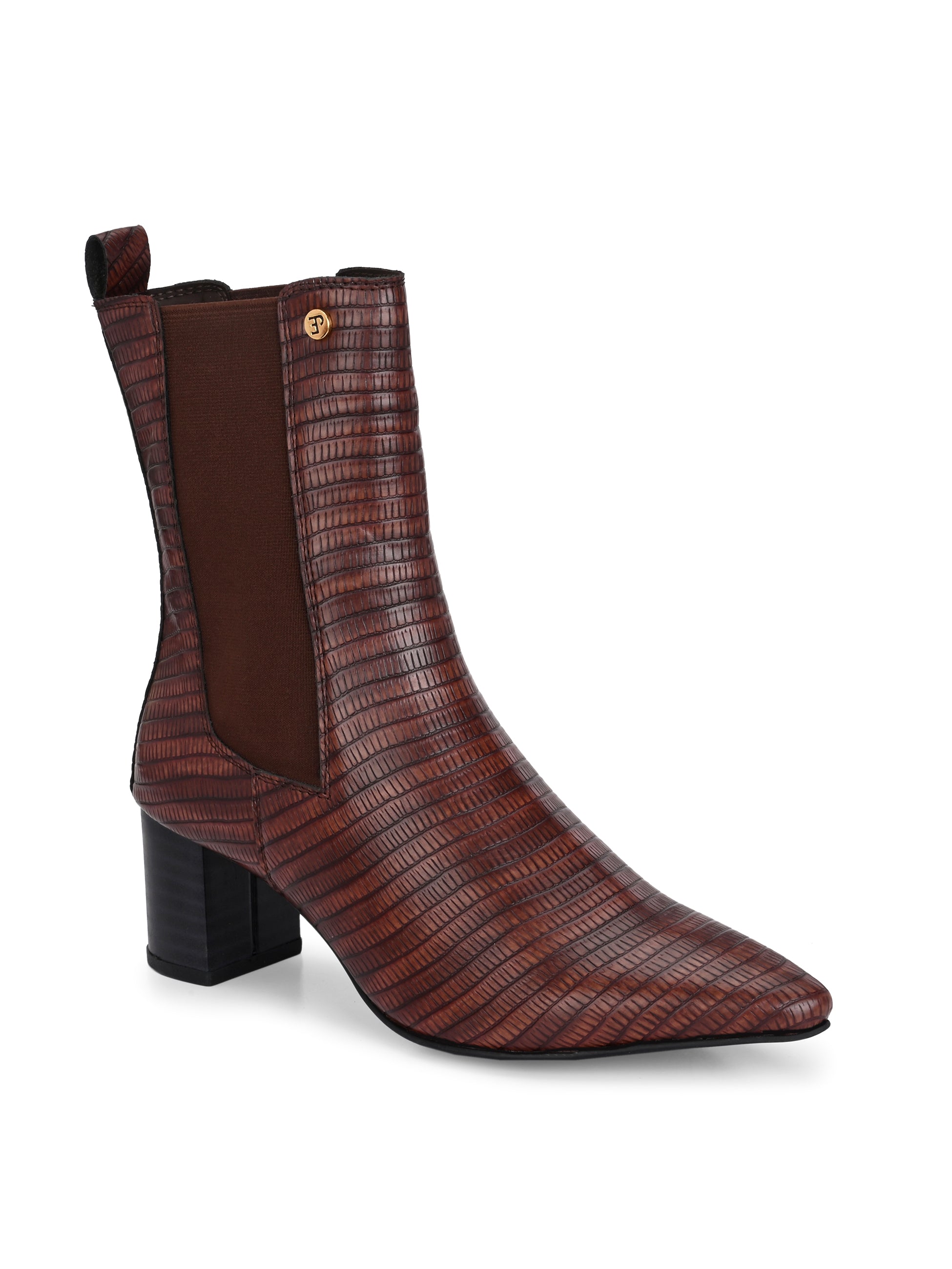 A sleek Tan crocodile-textured ankle boot with a pointed toe and mid-block heel, featuring an elastic side panel and a gold accent logo.