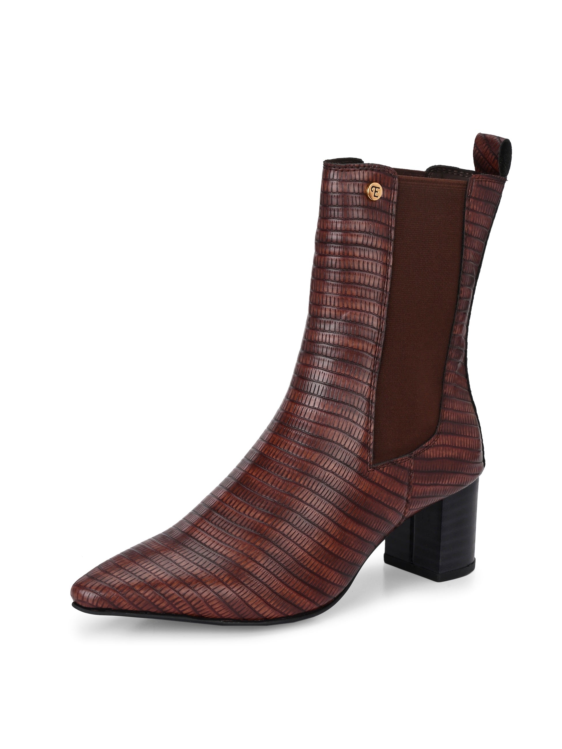 A stylish Tan ankle boot with a smooth leather finish, almond-shaped toe, mid-block heel, elastic side panel, and a gold accent logo.