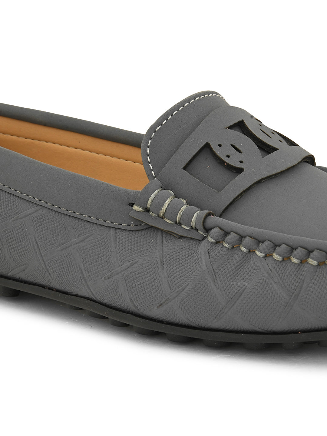 A gray loafer with textured stitching and a decorative strap across the top, viewed from the side.