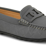 A gray loafer with textured stitching and a decorative strap across the top, viewed from the side.