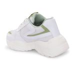 A green tennis shoe with a sleek design and lightweight construction, suitable for athletic activities.