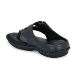 A navy blue leather sandal with a thong style and a padded footbed, featuring a curved strap design on a black sole.