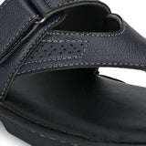 A navy blue leather sandal with a thong style and a padded footbed, featuring a curved strap design on a black sole.