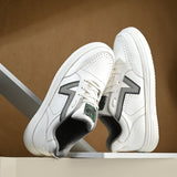 These Men Striped Round Toe Mesh Sneakers combine white leather with black and grey detailing, perfect for a modern, casual look.