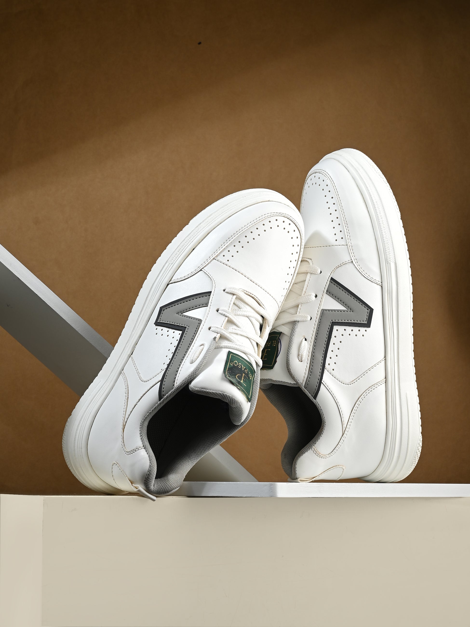 These Men Striped Round Toe Mesh Sneakers combine white leather with black and grey detailing, perfect for a modern, casual look.