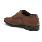 A brown leather dress shoe with laces on a white background.