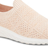 Peach slip-on sneaker with a breathable knitted upper, perforated design for ventilation, and a cushioned white sole for comfort and flexibility.