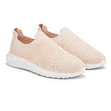 Peach Slip-On Lightweight Women Shoes with a breathable knitted upper, perforated design for ventilation, and a cushioned white sole for comfort and flexibility.