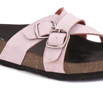 Pink slip-on flats, showcasing its design and material details.