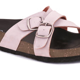Pink slip-on flats, showcasing its design and material details.