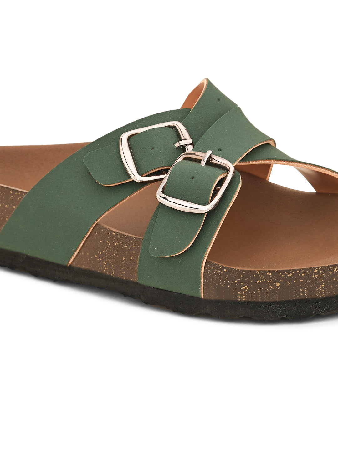 Green slip-on flats, showcasing its design and material details.