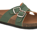 Green slip-on flats, showcasing its design and material details.