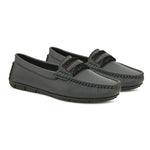 A single dark gray leather sleek loafer for women with a textured sole and decorative strap across the front.
