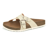 White slip-on flats, showcasing its design and material details.