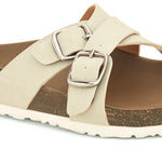 White slip-on flats, showcasing its design and material details.